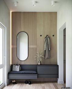 there is a bench and mirror in this modern room with wood paneling on the walls