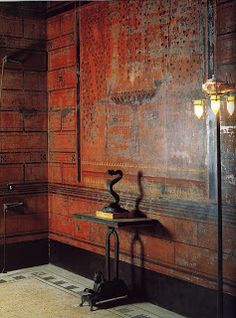 an old fashioned bathroom with wood paneling and tile walls, including a shower stall