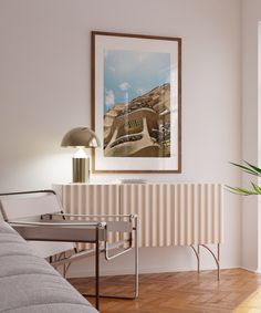 a room with a radiator and a painting on the wall