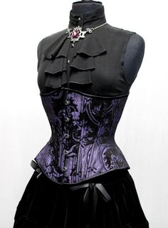 "Comes in corset sizes 22 - 32. Natural Waist - Corset Size 25\" - 26\"=20 27\" - 28\"=22 29\" - 30\"=24 31\" - 32\"= 26 33\" - 35\"= 28 36\" - 37\" = 30 38\" - 39\" =32 40\" - 41\" = 34 Hourglass shape.. a heavily constructed underbust corset with gorgeous silver/back tapestry outer layer and comfortably black cotton lining on the inside. Spiral steel boning on the sides, front and back for flexible support. Laces up in back with strong satin lacing and gunmetal grommets. **This listing is for Elissabat Costume, Woman In Corset, Purple And Black Outfits, Dark Corset, Corset Purple, Tapestry Corset, Rave Outfits Men, Goth Prom, Purple Goth