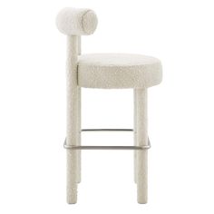 a white stool with a round seat and metal frame on the back, in front of a white background