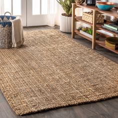 Natural jute fiber and a chunky texture make this handwoven rug a great addition to your home. The solid jute color works almost anywhere, in both modern or traditional rooms. This rug is reversible for longer wear. This woven jute rug is about a half inch thick, without pile Natural jute fibers are dyed Gray Perfect for bohemian or coastal living 100% Jute No backing, use of rug pad is recommended (sold separately) Handwoven in India Color: Gray Thickness measures: 0.5 in. Jute Lights, Eclectic Area Rug, Synthetic Rugs, Gorgeous Bathroom, Clean Bedroom, Natural Area Rugs, Jute Area Rugs, Bohemian Area Rugs, Dining Room Rug