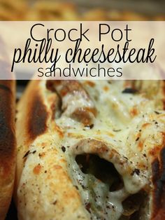 a close up of some bread with cheese and meat on it in front of the words crock pot philly cheesesteak sandwiches