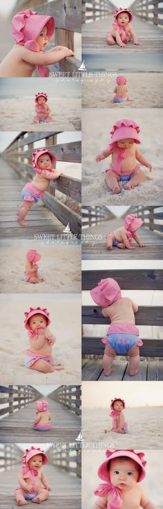 baby in pink hat sitting on the beach with her hands up to her face and legs crossed