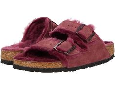 Birkenstock Arizona Shearling - Women's Shoes : Maroon/Maroon Suede/Shearling : No need for cold toes this season, so cozy up with a classic, the soft Arizona Shearling sandal! Soft premium suede upper features adjustable straps for a durable exterior and custom fit. The shearling-lined, contoured footbed will mold to the shape of your foot creating a custom footbed that supports and cradles your each and every step. Raised toe bar is designed to encourage the natural gripping motion of your fee Leather Sandals With Faux Fur Lining, Shearling Open Toe Sandals With Removable Insole, Shearling Open Toe Sandals With Cushioned Footbed, Round Toe Sandals With Faux Fur Lining In Shearling, Shearling Sandals With Faux Fur Lining And Round Toe, Winter Shearling Slippers With Textured Footbed, Winter Sandals With Faux Fur Lining And Round Toe, Winter Shearling Sandals With Round Toe, Casual Shearling Sandals With Round Toe