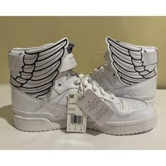 Elevate Your Style With These Adidas X Jeremy Scott Forum Hi Wings 4.0 Shoes In 'Opal White'. The Shoes Feature A Solid Pattern, Mid-Top Shoe Shaft Style And Standard Shoe Width. New With Tags No Box Us 11.5 Mid Top Shoes, Opal White, Jeremy Scott, Mid Top, Shoes Adidas, Adidas X, White Adidas, Solid Pattern, Adidas Shoes