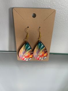 Beautiful, bright colored earrings.  Makes a great gift for you or someone on your gift list. Colorful Earrings As A Gift, Multicolor Hand Painted Earrings, Adjustable Trendy Teardrop Earrings For Gifts, Trendy Adjustable Teardrop Earrings For Gift, Adjustable Rainbow Earrings As Gift, Fun Multicolor Hypoallergenic Jewelry, Trendy Colorful Earrings As Gift, Trendy Colorful Earrings For Gift, Multicolor Hand Painted Drop Earrings