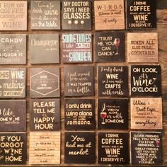 many different types of wine signs are on the wooden wall in front of a window