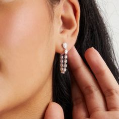 ABOUT THE PRODUCTLightweight and easy to wear you'll exude carefree confidence in these slinky, silky front back swag earrings with glittering mixed cubic zirconia stones.Metal: BrassPlating: 18KT GoldStones: Cubic ZirconiaLength: 60.1mm (2-3/8")Width: 4.2mm (1/8") Front Back Earrings, Brass Color, Prong Setting, Gold Earrings, Cubic Zirconia, Tennis, Nordstrom, Stone, Gold