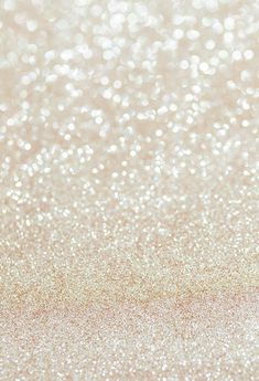 a white and gold glitter background