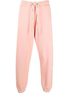 pink cotton logo print to the side drawstring fastening waist two side slit pockets rear welt pocket elasticated ankles Angels Logo, Cotton Logo, Palm Angels, Mens Activewear, Pink Cotton, Welt Pocket, Logo Print, Track Pants, Pajama Pants