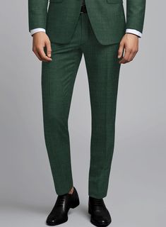 Define majesty anew with our Loro Piana Catalina Wool Silk Linen Pants, where handpicked designs meet tailored perfection. Crafted from a top-notch fusion of the finest wool, silk, and linen, this pant embodies quintessence. Its solid green hue boldly reflects the wearer's discerning taste and willingness to embrace daring fashion choices. Whether worn at prestigious soirées or in the commanding atmosphere of the boardroom, this masterpiece exudes unparalleled intricacy.   A marriage of elegance and comfort, Loro Piana fabrics are made using the highest quality raw materials in the world, in their purest form or blended together. A sophisticated response to the dictates of contemporary elegance, these fabrics lend themselves to a wide range of styles to meet the varied needs of today’s war Fitted Green Wool Suit, Green Fitted Wool Suit, Tailored Green Dress Pants With Welt Pockets, Green Tailored Dress Pants With Welt Pockets, Semi-formal Green Fitted Bottoms, Fitted Green Bottoms For Semi-formal Occasions, Green Fitted Bottoms For Semi-formal Occasions, Classic Fitted Green Dress Pants, Classic Green Fitted Dress Pants