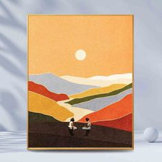 an image of two people sitting on a hill with the sun in the sky and mountains behind them