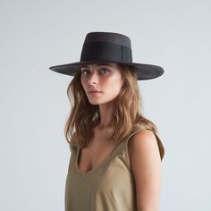 The Ibiza is this season’s playful reimagining of the classic Panama hat, featuring a wider than usual band for a fresh, sophisticated look. • Handcrafted in Ecuador by Artisans • Made with 100% Natural Toquilla Straw • Brim Size: 4” • Size-Adjustable Inner Band Modern Panama Hat With Short Brim For Spring, Modern Beach Hats For Summer, Modern Beach Hats For Spring, Classic Wide Brim Top Hat For Spring, Modern Summer Beach Hats, Elegant Spring Top Hat With Flat Crown, Modern Fedora Panama Hat For Spring, Modern Flat Brim Fedora For Spring, Modern Spring Fedora With Flat Brim