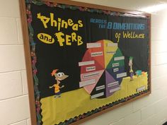 a bulletin board on the wall in a classroom