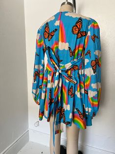 Multicolor Butterfly Print Summer Dress, Summer Butterfly Print Multicolor Dresses, Rainbow Cotton Dresses For Spring, Summer Multicolor Butterfly Print Dress, Spring Rainbow Cotton Dresses, Multicolor Cotton Mini Dress For Daywear, Flowy Multicolor Mini Dress For Daywear, Rainbow Long Sleeve Summer Dress, Long Sleeve Rainbow Summer Dress