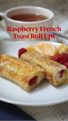 raspberry french toast roll ups on a white plate