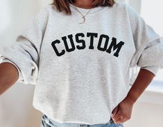 Custom Sweatshirt, College Style Text Shirt, Customized Sweatshirt, Personalized Crewneck Sweater, University State Tshirt, Custom City Tee PLEASE NOTE - There are various different styles available in listing, please ensure you have chosen correct one before checkout. Size guide in pictures  Check our shop out for matching design in mug and tote bag https://www.etsy.com/shop/sasiprints/ * S I Z I N G * ✺ Sizing is unisex so runs like men's, though not overly large ✺ Most women find their typical size works best, since they are meant to fit a touch loose and go up 1 or 2 sizes if you want the oversized look. ✺ Size guide and fit: The size chart is listed in photos above. Please use the measurement for the most accurate sizing. * PRINT INFO * ✺ Printed with DTG - Direct to Garment Printing Cute Crewneck, Varsity Sweatshirt, Little Sister Gifts, Slogan Sweatshirt, Pug Mom, Travel Outfits, Oversized Crewneck, Grandma Shirts, Make Her Smile