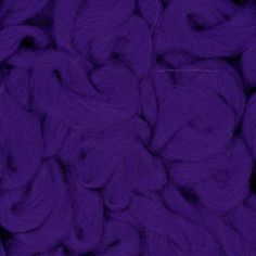 purple yarn is shown in close up view