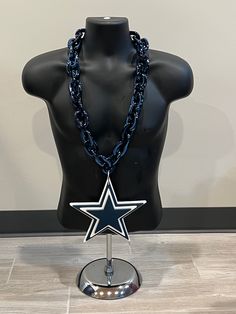 100% Authentic NFL Licensed Product Aminco One Size Dallas Cowboys Football Unisex Adult Size 34” inch rope style chain One Fan Chain Chain made with high quality hard plastic Logo Measurements: approx 9” X 3.5” X 0.5” Foam Lion Thick vibrant chain to showcase your team pride Made in the USA Dallas Cowboys Football, Cowboys Football, Dallas Cowboys, Hard Plastic, Dallas, Nfl, Lion, Chain Necklace, Football