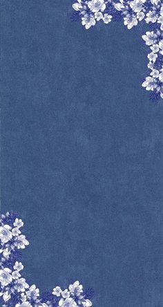 a blue background with white flowers on the bottom and an empty space in the middle