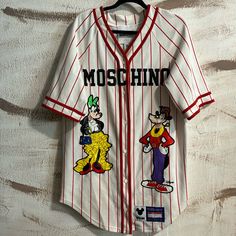 Unisex Baseball Jersey. Striped With Disney Characters. Red & White Color In An Oversized Fit. Scalloped Hem. Bust 22” Flat Length 30-34” Moschino Dress, Baseball Jersey, Scalloped Hem, Baseball Jerseys, Dresses Xs, Moschino, White Color, Red White, Red And White