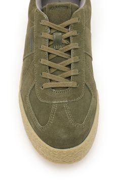 Take your casual style up a notch with this low-top suede sneaker featuring matching laces for a monochrome look. Lace-up style Leather upper/recycled-polyester lining/rubber sole Imported Casual Lace-up High-top Sneakers With Gum Sole, Suede Sneakers With Elastic Laces, Low-top Suede Sneakers With Elastic Laces, Casual Suede High-top Sneakers With Vulcanized Sole, Casual High-top Lace-up Sneakers With Gum Sole, Casual High-top Sneakers With Gum Sole, Casual Suede Sneakers With Rubber Sole, Casual Suede High-top Sneakers With Perforated Toe Box, Casual Suede High-top Sneakers With Rubber Sole