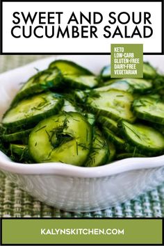 a white bowl filled with cucumbers on top of a table