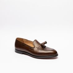 Dark brown burnished calf tassel loafer with single leather sole. Fitting E, last 325. Made in England Goodyear Welted Slip-on Tassel Loafers, Timeless Goodyear Welted Plain Toe Tassel Loafers, Timeless Tassel Loafers With Goodyear Welted Plain Toe, Goodyear Welted Moc Toe Tassel Loafers For Galas, Classic Tassel Loafers Goodyear Welted For Galas, Timeless Tassel Loafers With Leather Sole For Galas, Crockett And Jones, Tassel Loafers, Boat Shoes