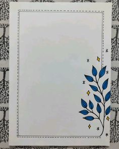 a white card with blue leaves and stars in the middle, on a black and white background