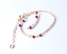 "Custom Length Sterling Silver / Gold Filled Genuine Ruby Beaded Necklace - 30th, 40th 50th 60th 70th Birthday Gift - July Birthstone Jewelry Minimal sterling silver or 14k gold filled necklace with 3-7 natural rubies. The perfect birthday gift. ✦ Comes in 14-18\", with additional 1\" extension chain ✦ The rubies are 2-3mm. Ruby has been originated from corundum family. Corundum of all colors is acknowledged as sapphire, except shades of red. Ruby is the traditional birthstone of those born in J Jewelry Minimal, Saturn Necklace, Christmas Gifts For Wife, Peridot Necklace, Ruby Beads, July Birthstone Jewelry, Ruby Necklace, Tiny Earrings, Ruby Jewelry