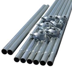 several stainless steel pipes are lined up together