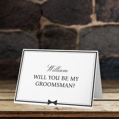 a card that says will you be my groomsman?