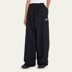 Balenciaga wide-leg tracksuit pants High rise; elastic waist  Side slip pockets Logo embroidery at the hip  Full length Relaxed fit  Cotton/nylon/polyamide Made in Italy Balenciaga Track Pants, Balenciaga Pants, Balenciaga Top, Baggy Sweatpants, Tracksuit Pants, Logo Embroidery, Embroidery Logo, Design Inspo, Workout Pants