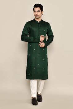 Sacramento green kurta featuring hand embroidery in the front and sleeves. Paired with a white pyjama. - Aza Fashions Green Traditional Wear With Dori Work And Long Sleeves, Green Cotton Kurta With Dori Work, Ceremonial Green Kurta With Chikankari Embroidery, Ceremonial Green Chikankari Embroidered Kurta, Ceremonial Green Chikankari Embroidery Kurta, Green Long Sleeve Kurta For Traditional Ceremonies, Green Kurta With Dabka Work For Ceremonial Occasions, Ceremonial Green Kurta With Dabka Work, Cotton Sherwani With Dori Work And Long Sleeves