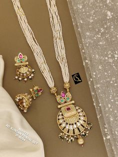 Description :- Antique Temple Pendant Set With Matte Gold Plating, One Gram Gold Necklace, Indian Jewelry, Temple Jewelry, Temple Necklace, South Indian Gift yourself a royal look with this perfectly crafted kundan necklace set from Manalisstudio. Crafted with high quality kundan stones and pearls, it is impressive in design. The green enamel artwork adds perfect texture to the design. Perfect for weddings and festivities, this antique necklace set should be put on with your favorite sari or lehenga. 100% Satisfaction. Long Lasting Plating, High-Quality Stones. Gifting :- This necklace and earring set comes in a beautiful manalisstudio gift box, making it an ideal gift for birthdays, weddings or anniversaries. Occasion :- Perfect choice for any Indian occasion. Care :- It is advisable that One Gram Gold Necklace, Antique Necklace Set, Temple Necklace, Kundan Necklace Set, Gold Necklace Indian, Indian Gifts, Temple Jewelry, Necklace Indian, Kundan Necklace