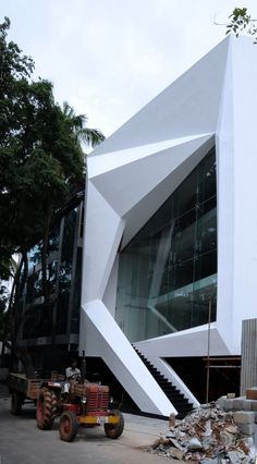 a large white building with an interesting design