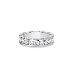 An eternity ring symbolizes something everlasting, but the Sky ring also conveys traits of sovereignty and composure. Protected by channels of golden walls, each diamond is carefully selected and hand set in this channel-set diamond eternity ring. A complete channel setting with gold spacing for logo, all by hand design. Made in the gold color of your choice. Total diamond weight approximately 5.70 carats for ring size 8. Luxury Channel Set Eternity Band Fine Jewelry, Yellow Gold Channel Set Eternity Band Gift, Yellow Gold Channel Set Eternity Band, Luxury Channel-set Eternity Band In Fine Jewelry Style, Necklace Length Chart, Hand Design, Diamond Eternity Ring, Channel Setting, Eternity Ring Diamond