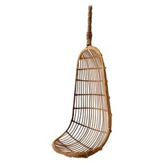 a hanging chair made out of rattan