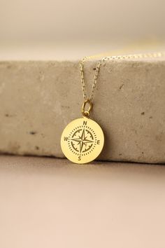 Gold Compass Pendant - Compass Gold Necklace ● Material of pendant: Solid Gold 14k ( REAL GOLD ) ● Metal Stamp: 14k ( REAL GOLD ) ● The pendant is available in 5 sizes: - 12,7 mm / 0.5 inches (Diameter) - 14,0 mm / 0,55 inches ( Diameter ) In the photos - 15,3 mm / 0.6 inches ( Diameter ) - 16,5 mm / 0,65 inches ( Diameter ) - 19,1 mm / 0,75 inches ( Diameter ) ( In the photos the size is 14mm / 0.55 inches Diameter ) ( Jump Ring inner diameter: 4 mm ) ● Material of chain: Solid gold 14k ( REAL Personalized Pendant Necklaces For Travel, Personalized Gold Jewelry For Travel, Personalized Gold Necklace For Travel, Gold Compass Necklace, Gold Necklace For Men, Compass Jewelry, Compass Pendant, Compass Necklace, Custom Pendants