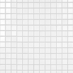 a white tiled wall with small squares on it