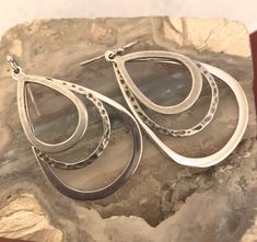 "Silpada Triple Sterling Silver Teardrop Earrings on Ear Wire. Silpada Arrow Logo stamped on back of earring. Approx. drop 2\" by 1\" including ear wire (1.625\" without wire) Silpada W1576 REF: \"Silpada Tri Teardrop\" Earrings" Hypoallergenic Metal Drop Teardrop Earrings, Hypoallergenic Metal Teardrop Drop Earrings, Hypoallergenic Metal Teardrop Earrings, Silver Teardrop Chandelier Earrings, Hypoallergenic Teardrop Chandelier Earrings, Hypoallergenic Teardrop Pendant Earrings, Sterling Silver Teardrop Chandelier Earrings, Nickel-free Metal Teardrop Earrings, Earrings On Ear