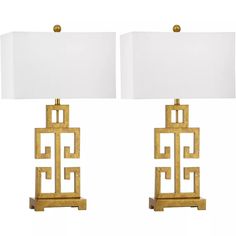 a pair of lamps with white shades on each lamp and one light that is gold