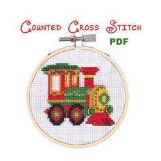 a cross stitch pattern with a train on it and the words, counted cross stitch