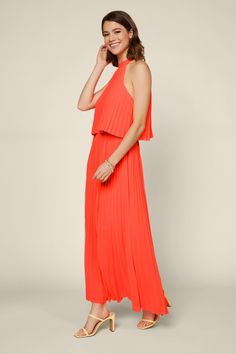 Stand out from the crowds in this Neon Orange Dress. This halter style maxi length dress is made from a pleasted material and features a unique silhouette and subtle pleat detailing. As a result, you’ll look timelessly stylish both day and night. Show ‘em what you’re made of in the Not Without You Dress — you won’t go anywhere without it. 100% Polyester Want to view this on the *Live* Sizing & Styling Guide?! Watch it here *You will need to scan through to find this specific item on the video. R Pleated Solid Color Maxi Dress For Evening, Flowy Maxi Length Pleated Evening Dress, Flowy Halter Maxi Dress For Evening, Chic Solid Pleated Maxi Dress, Chic Pleated Solid Color Maxi Dress, Chic Solid Color Pleated Maxi Dress, Spring Maxi Dress With Pleated Bodice, Spring Solid Color Maxi Dress With Pleated Bodice, Solid Halter Neck Maxi Dress For Date Night