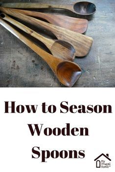 wooden spoons sitting on top of a table with the words how to season wooden spoons