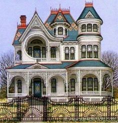 an old victorian style house with blue trim and iron fence around the front yard area