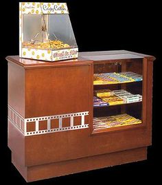 an old fashioned popcorn dispenser is on display for customers to purchase at the store