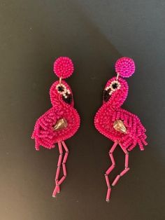 Flirty fun and in bright pink (of course!) flamingo birds with dangly legs are the focal of these hand-beaded earrings.  Post back. Flamingo fun!  Bright pink flamingo birds fall 4 ¼"  from the post earring and are sure to inspire conversations. 4 1/4" length. 26-596 Flamingo Birds, Pink Flamingos Birds, Flamingo Earrings, Flamingo Bird, Pink Flamingo, Pink Flamingos, Hand Beading, Bright Pink, Post Earrings