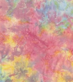 a multicolored tie - dyed background that looks like something out of the sky